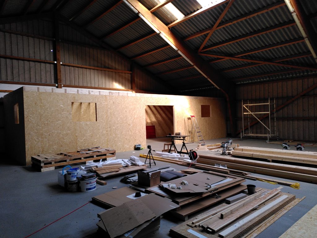 Wooden building in a hall.